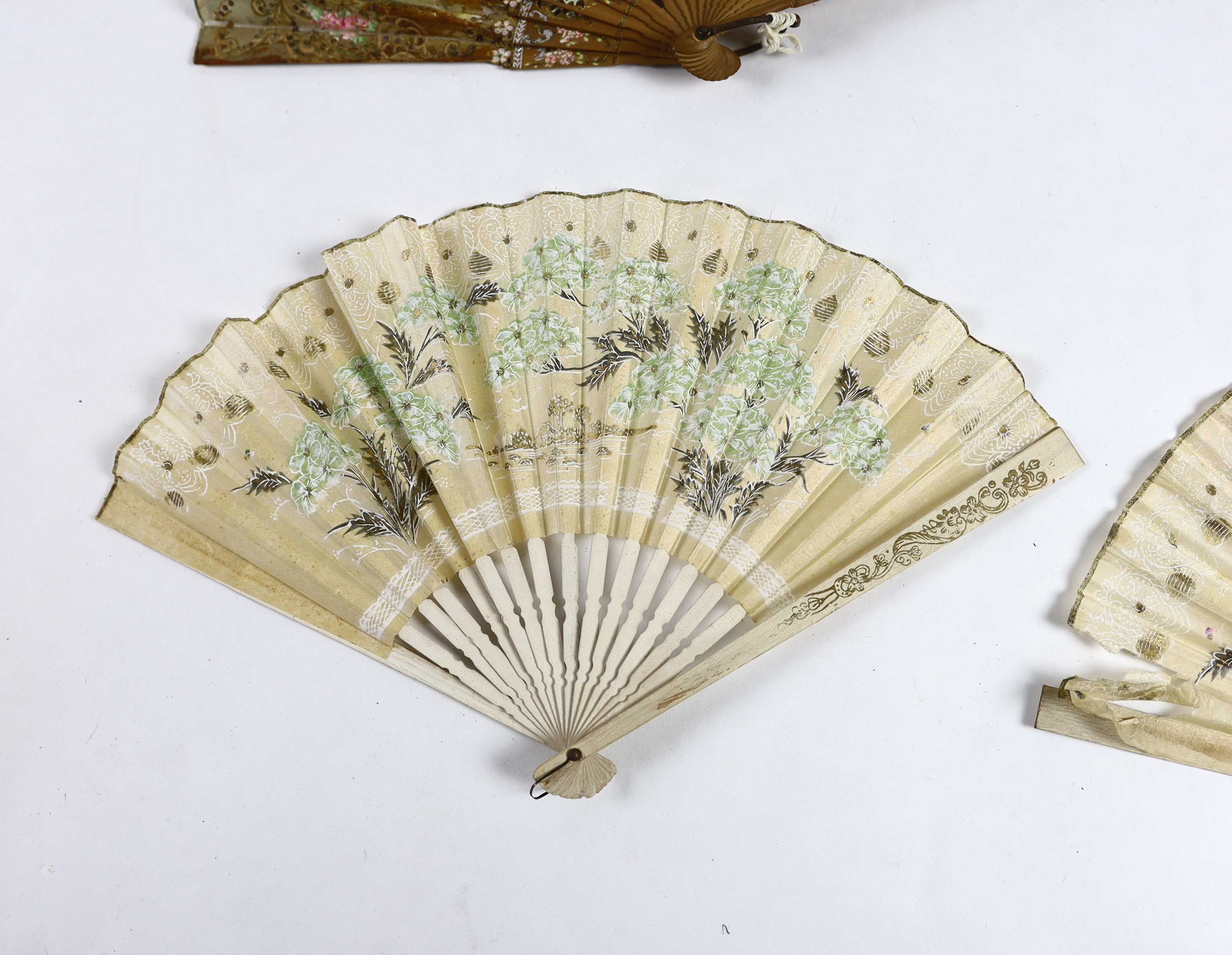 A collection of 19th and 20th century mostly paper fans, ten in reasonable condition useful for stage and film (16)